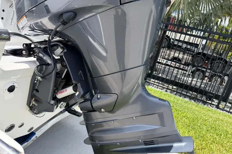 Slide: The Image of 2023 Tidewater 198 CC Adventure boat engine, featuring a sleek Yamaha outboard motor. - 6