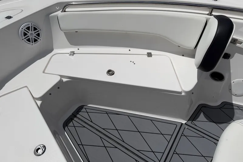 Slide: The Image of 2023 Tidewater 198 CC Adventure boat interior with seating and storage compartments. - 60