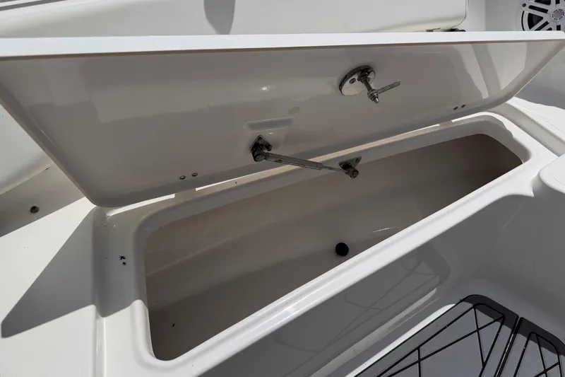 Slide: The Image of Open storage compartment on 2023 Tidewater 198 CC Adventure boat. - 63