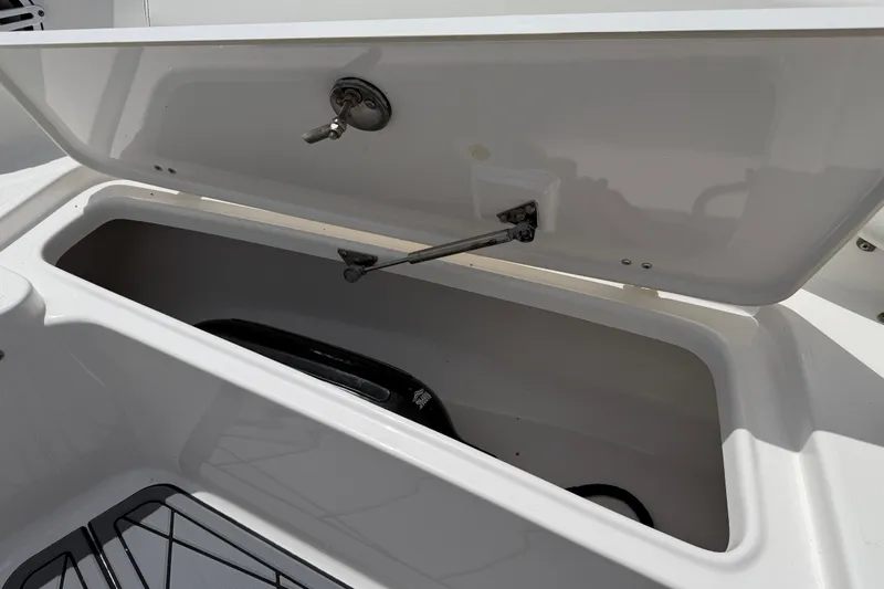 Slide: The Image of Open storage compartment on 2023 Tidewater 198 CC Adventure boat. - 64