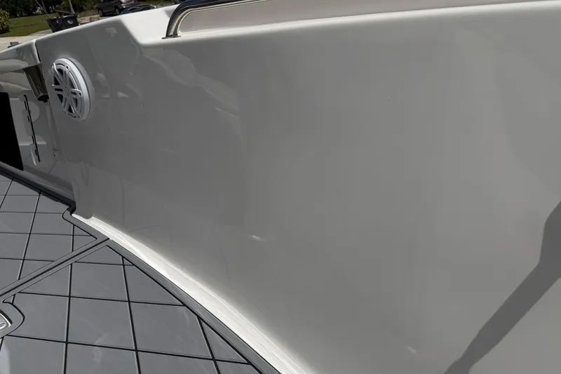 Slide: The Image of 2023 Tidewater 198 CC Adventure boat interior with speaker and sleek design. - 67