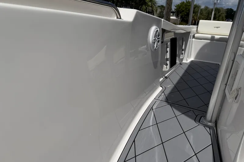 Slide: The Image of 2023 Tidewater 198 CC Adventure boat interior with sleek design and modern flooring. - 72