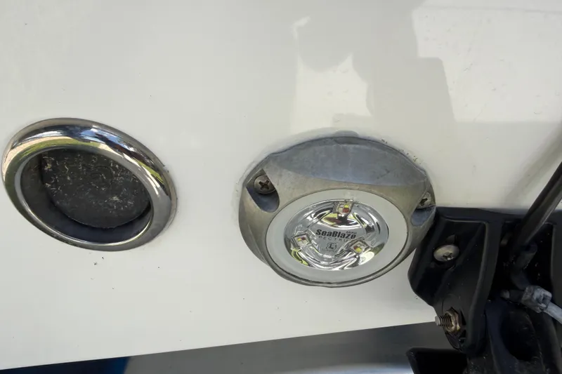Slide: The Image of 2023 Tidewater 198 CC Adventure boat detail with SeaBlaze underwater light. - 9