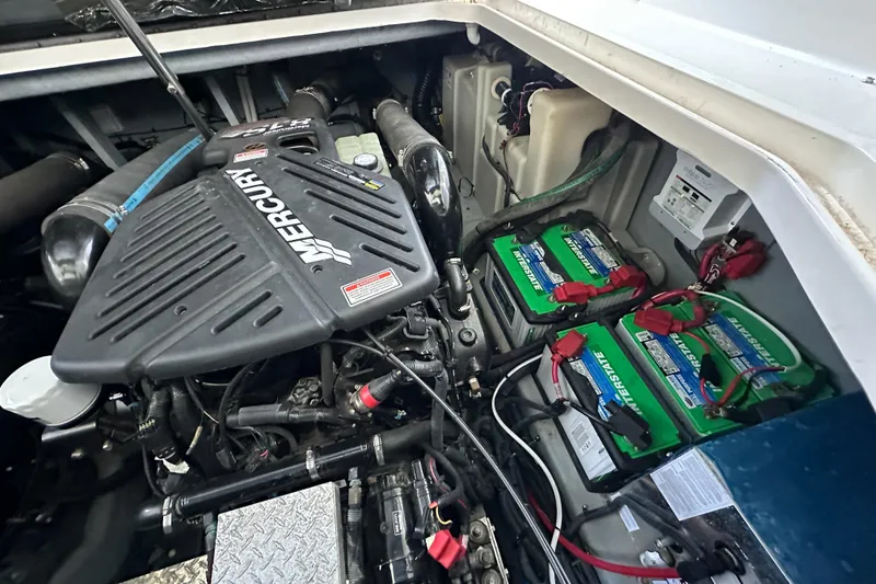 Slide: The Image of Engine compartment of a 2001 Sea Ray 410 Sundancer with Mercury engine and batteries. - 13