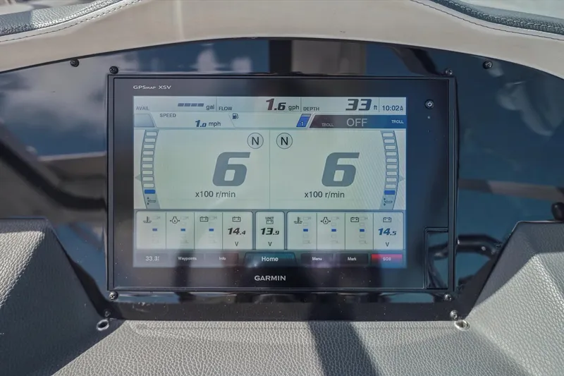 Slide: The Image of Garmin GPS display on 2019 Regal 33 OBX boat dashboard showing speed and RPM. - 19