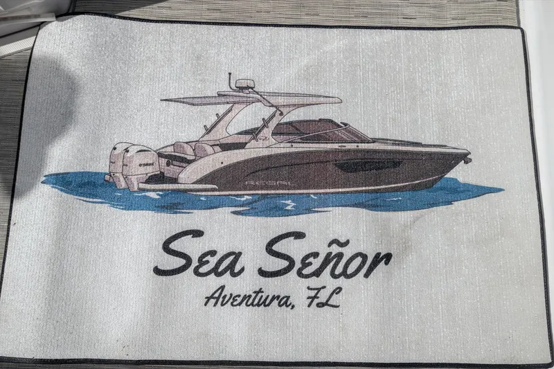 Slide: The Image of Illustration of a 2019 Regal 33 OBX boat with "Sea Señor" text, Aventura, FL. - 34