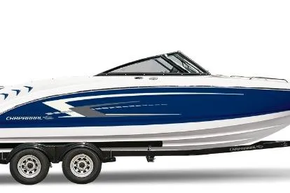 The Image of 2025 Chaparral 21 SSi boat, sleek blue and white design, on a trailer. - 0