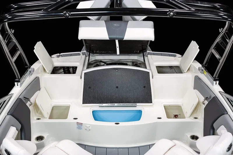 Slide: The Image of Manufacturer Provided Image: 2025 Chaparral 21 SSi boat interior with storage compartments and seating. - 13