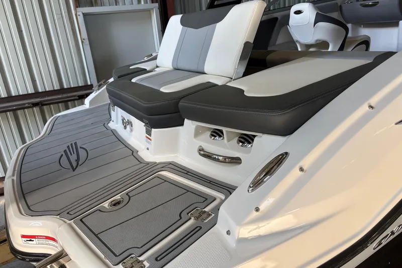 Slide: The Image of 2025 Chaparral 21 SSi boat interior with sleek seating and modern design. - 2