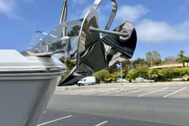 Slide: The Image of Close-up of a 2019 Regal 26 XO boat anchor in a parking lot. - 20