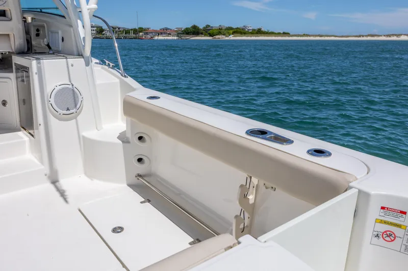 Slide: The Image of 2017 Boston Whaler 315 Conquest boat interior with ocean view. - 19
