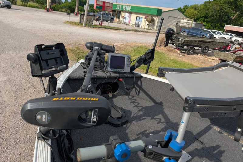 Slide: The Image of 2017 Lowe Fishing Machine 165SC Pro with Minn Kota trolling motor and fish finder. - 13