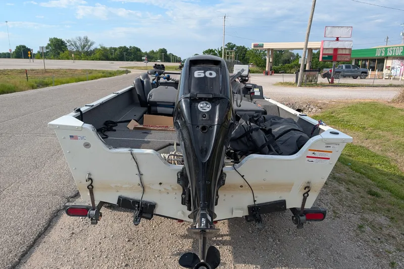 Slide: The Image of 2017 Lowe Fishing Machine 165SC Pro with 60HP motor on roadside. - 5
