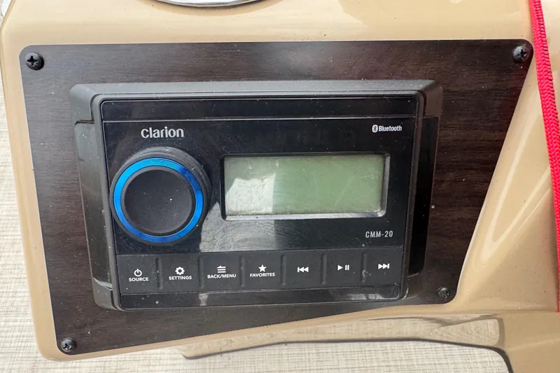 Slide: The Image of Clarion CMM-20 Bluetooth stereo on 2022 Harris Sunliner 250 boat dashboard. - 22