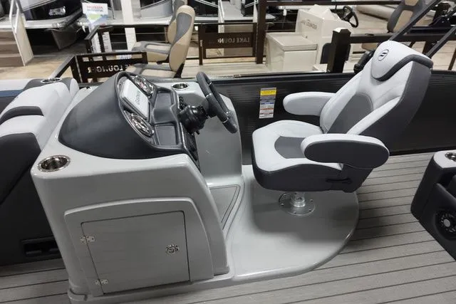 Slide: The Image of Interior view of Flagship Pontoons D22 B XT 2025 helm station. - 10