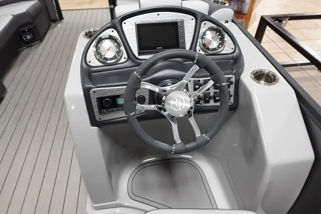 Slide: The Image of Flagship Pontoons D22 B XT 2025 helm with modern dashboard design. - 12