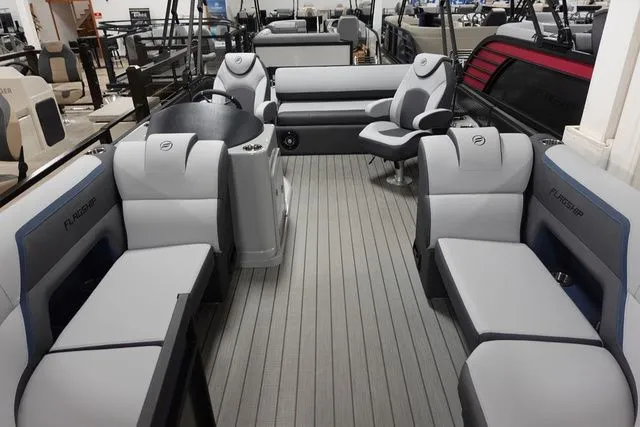 Slide: The Image of Interior of 2025 Flagship Pontoons D22 B XT with luxurious seating. - 3