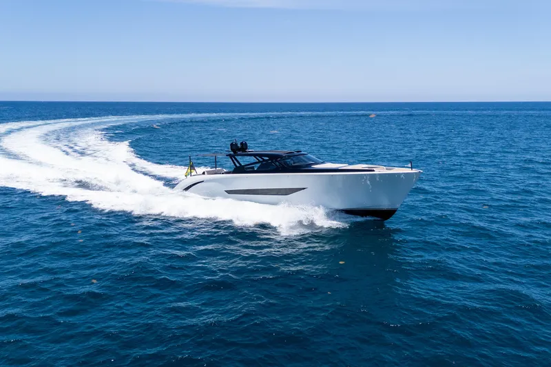 The Image of 2025 Wajer 77 yacht cruising on open sea under clear blue sky. - 0