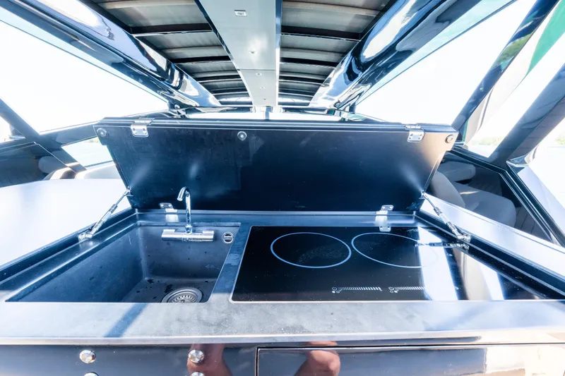 Slide: The Image of Luxury kitchen area on 2025 Wajer 77 yacht with sink and stovetop. - 15