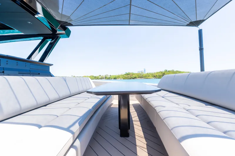 Slide: The Image of Luxurious seating area on 2025 Wajer 77 yacht with scenic water view. - 21