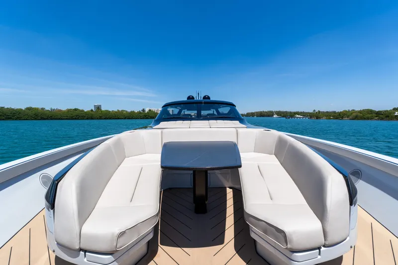 Slide: The Image of Luxurious 2025 Wajer 77 yacht with elegant seating, cruising on a sunny day. - 22