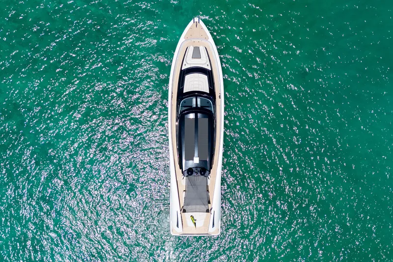 Slide: The Image of Aerial view of 2025 Wajer 77 yacht on turquoise water. - 23