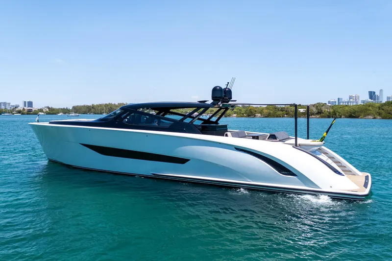 Slide: The Image of Luxury 2025 Wajer 77 yacht cruising on clear blue waters under a sunny sky. - 29
