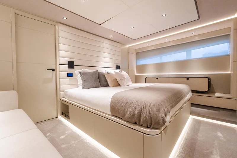 Slide: The Image of Luxurious bedroom interior of 2025 Wajer 77 yacht with modern design and ambient lighting. - 3