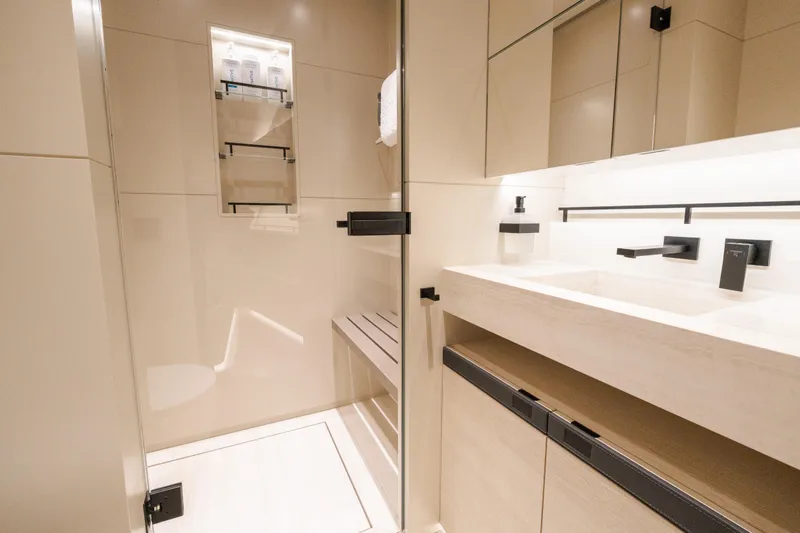 Slide: The Image of Luxurious bathroom interior of 2025 Wajer 77 yacht, featuring modern fixtures and sleek design. - 6