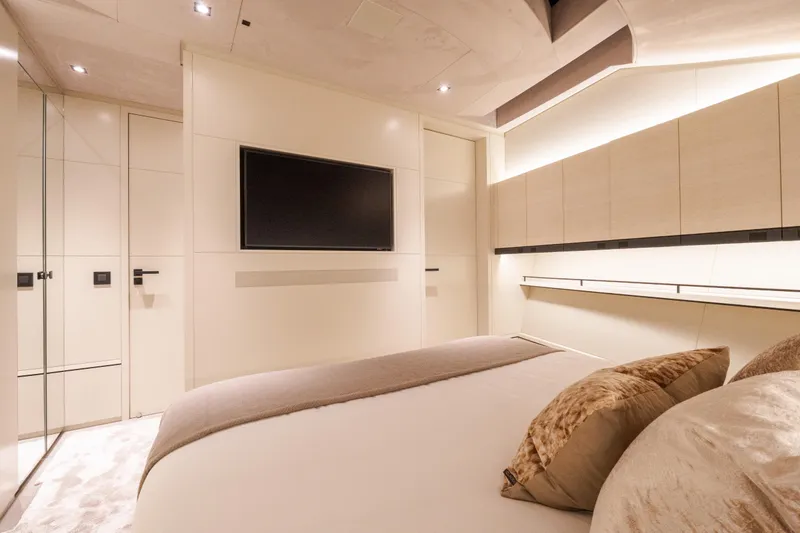 Slide: The Image of Luxurious interior of 2025 Wajer 77 yacht bedroom with modern design and ambient lighting. - 8