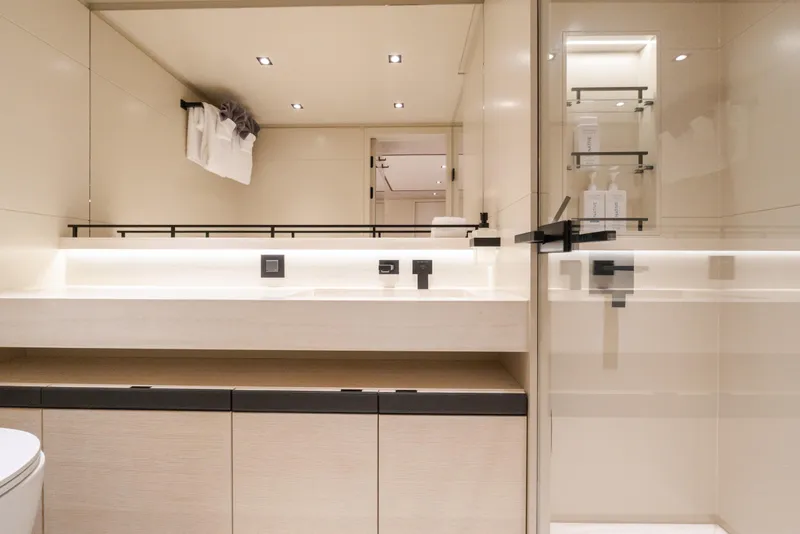 Slide: The Image of Luxurious bathroom interior of 2025 Wajer 77 yacht, featuring modern fixtures and elegant design. - 9