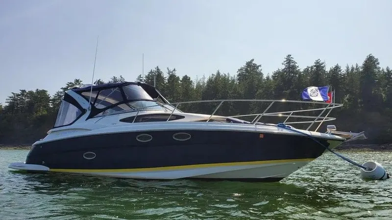 The Image of 2007 Regal 3360 Window Express boat on calm water. - 0