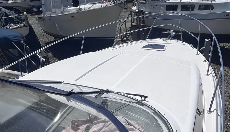 Slide: The Image of 2007 Regal 3360 Window Express boat at a dock. - 10