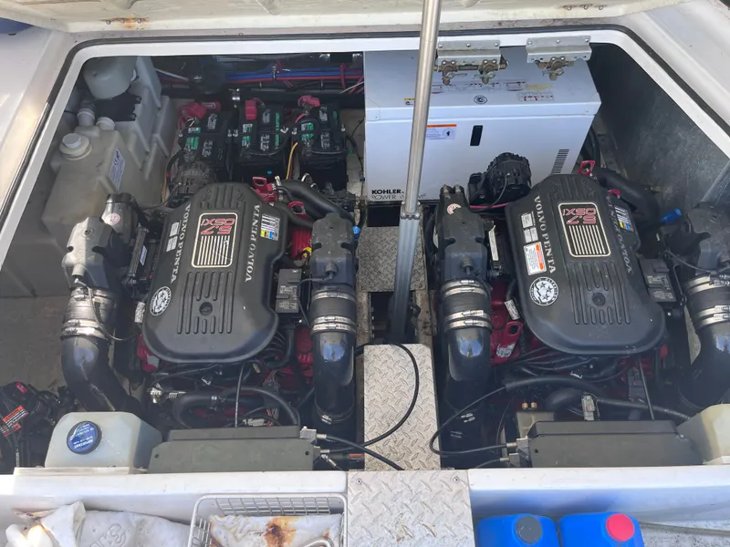Slide: The Image of Engine compartment of a 2007 Regal 3360 Window Express boat. - 38
