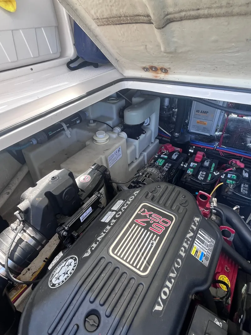 Slide: The Image of Engine compartment of a 2007 Regal 3360 Window Express boat. - 39