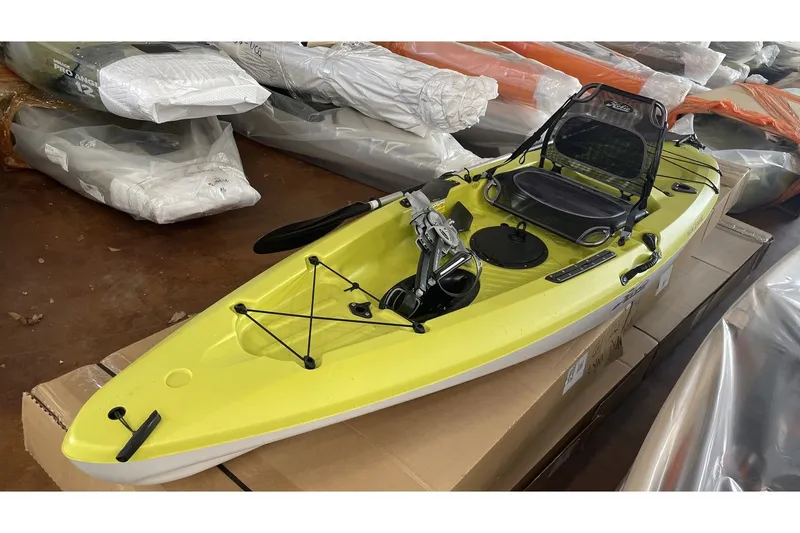 The Image of Yellow Hobie Mirage Passport 10.5 R kayak, 2021 model, stored on boxes. - 1