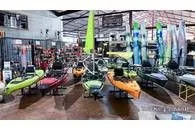 Slide: The Image of Hobie Mirage Outback 2023 kayaks displayed in a store. - 5