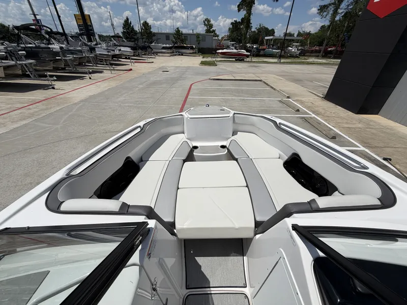 Slide: The Image of Interior view of 2024 Yamaha Boats AR250 with seating area. - 27