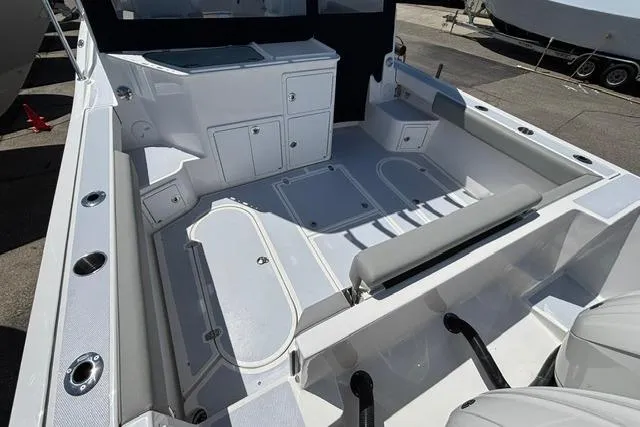 Slide: The Image of 2026 NorthCoast 285 HT boat interior with seating and storage compartments. - 3