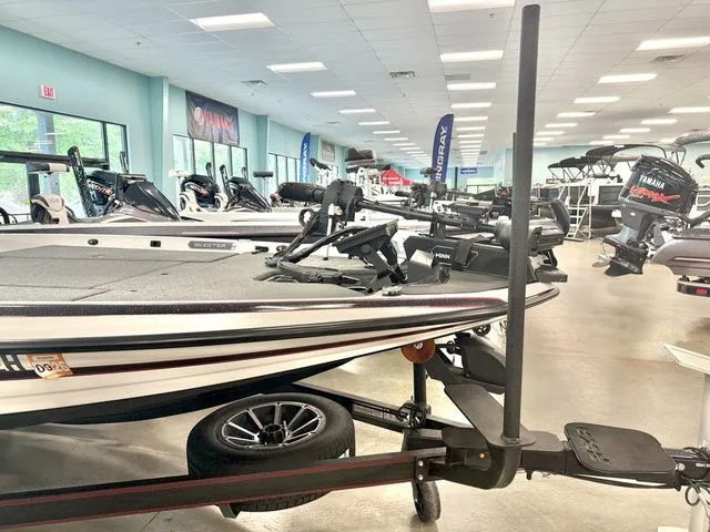 Slide: The Image of 2026 Skeeter FXR20 Apex boat in showroom. - 9