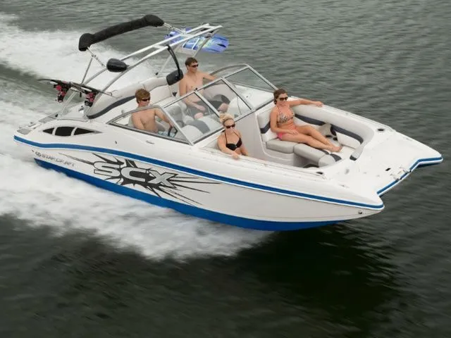 Slide: The Image of Starcraft 210 I/O SCX 2015 boat on water with passengers. - 14