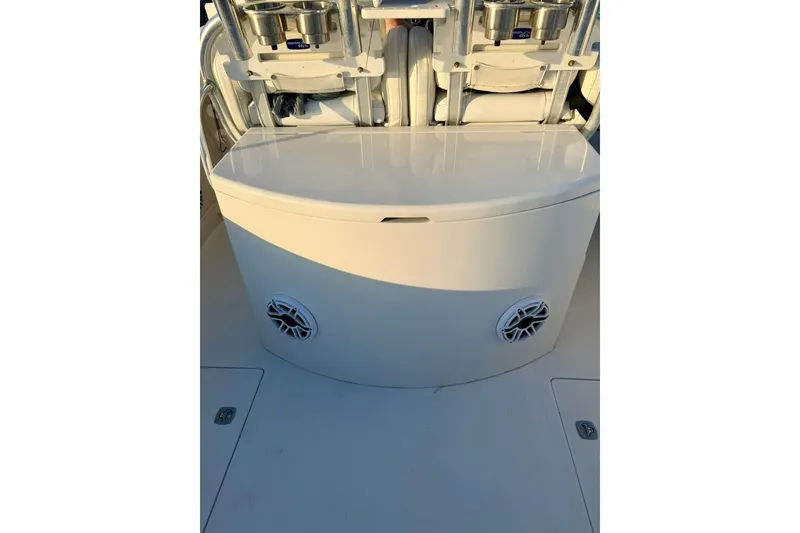 Slide: The Image of 2008 Jupiter 38 FS boat interior with storage compartment and speakers. - 10