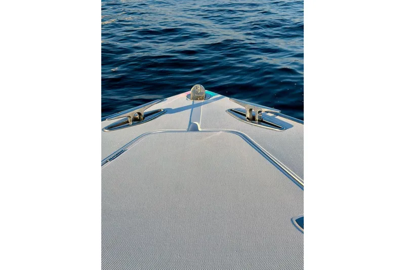Slide: The Image of Bow of 2008 Jupiter 38 FS boat on calm blue water. - 7