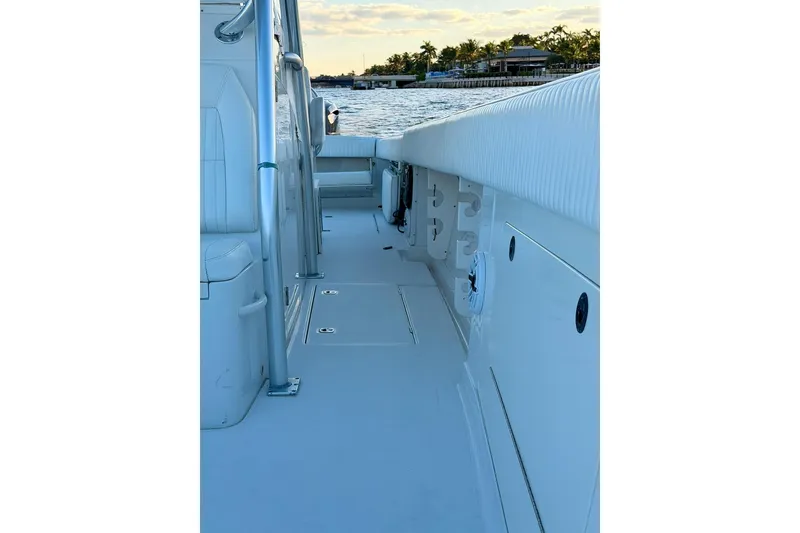 Slide: The Image of 2008 Jupiter 38 FS boat deck with ocean view and coastal background. - 8