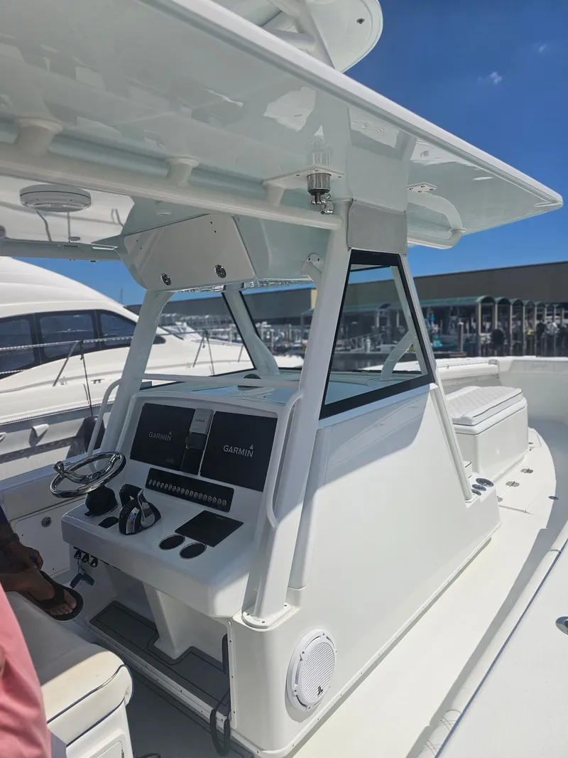 Slide: The Image of 2017 Yellowfin 39 Offshore boat with modern helm console. - 10