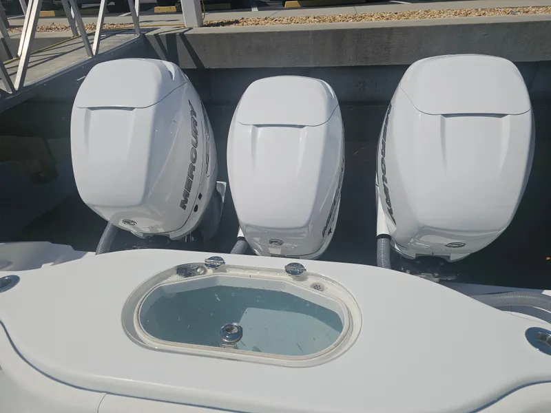 Slide: The Image of Three Mercury engines on a 2017 Yellowfin 39 Offshore boat. - 3