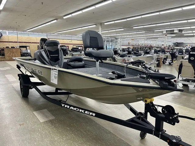 Slide: The Image of 2026 Tracker Pro Team 175 Crappie Edition boat in showroom. - 3