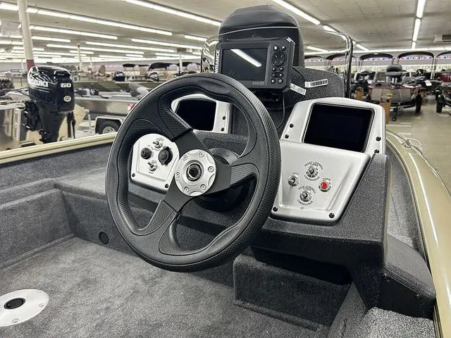 Slide: The Image of Interior view of the 2026 Tracker Pro Team 175 Crappie Edition boat. - 4