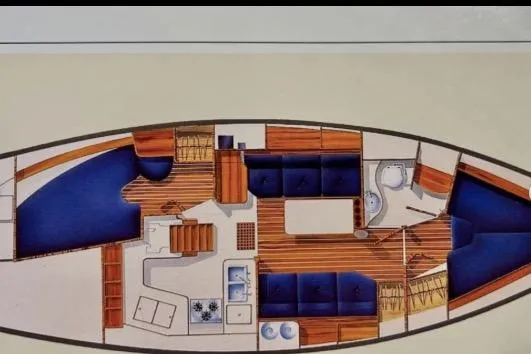 Slide: The Image of Floor plan of a 1989 Island Packet 35 sailboat, showcasing interior layout and design. - 13