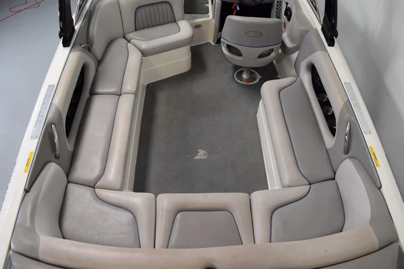 Slide: The Image of Interior of a 2007 Centurion SV 240 boat with spacious seating and modern design. - 11